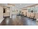 Finished basement with workout equipment and ample space, ideal for fitness and recreation at 12421 Highway 36, Covington, GA 30014