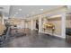 Finished basement with workout equipment and ample space, ideal for fitness and recreation at 12421 Highway 36, Covington, GA 30014