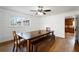 Bright dining room with rustic table and seating at 12421 Highway 36, Covington, GA 30014