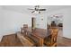Bright dining room with rustic table and seating at 12421 Highway 36, Covington, GA 30014
