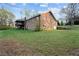 Exterior view of this beautiful brick home with a walk out basement at 12421 Highway 36, Covington, GA 30014