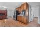 Kitchen featuring stainless steel appliances and wood cabinets at 12421 Highway 36, Covington, GA 30014