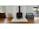Living room with a charming wood burning stove at 12421 Highway 36, Covington, GA 30014