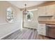 Eat in kitchen features hardwood floors, and a custom light fixture at 3640 Barbara Dr, Douglasville, GA 30135