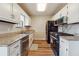 Modern kitchen featuring stainless steel appliances and granite countertops at 3640 Barbara Dr, Douglasville, GA 30135