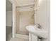 Bathroom featuring a glass enclosed shower with a pedestal sink and decorative tile flooring at 4135 Shoshone Valley Rd, Marietta, GA 30068