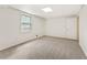 Neutral bedroom featuring a window and neutral carpet at 4135 Shoshone Valley Rd, Marietta, GA 30068