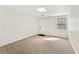Bedroom with carpeting, natural light, and neutral walls and ceiling at 4135 Shoshone Valley Rd, Marietta, GA 30068