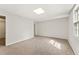 Neutral carpeted bedroom with natural light at 4135 Shoshone Valley Rd, Marietta, GA 30068