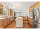 Spacious eat-in kitchen with stainless steel appliances and a center island for ample counter space at 4135 Shoshone Valley Rd, Marietta, GA 30068