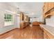 Bright kitchen with hardwood floors, wood cabinetry, and a view to the backyard at 4135 Shoshone Valley Rd, Marietta, GA 30068