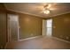 Cozy carpeted bedroom with overhead lighting, freshly painted with neutral colors at 1074 Frog Leap Nw Trl, Kennesaw, GA 30152