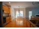 Eat-in kitchen with hardwood floors, stainless steel appliances, and plenty of natural light at 1074 Frog Leap Nw Trl, Kennesaw, GA 30152