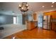 Open kitchen with stainless steel appliances, breakfast bar, and view to living area at 1074 Frog Leap Nw Trl, Kennesaw, GA 30152