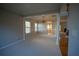 Bright and spacious living room featuring neutral paint, hardwood floors, elegant moldings, and ample natural light at 1074 Frog Leap Nw Trl, Kennesaw, GA 30152