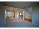 Bright and spacious living room featuring neutral paint, hardwood floors, elegant moldings, and natural light at 1074 Frog Leap Nw Trl, Kennesaw, GA 30152