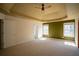 Expansive main bedroom with tray ceiling and neutral carpet, featuring plenty of natural light at 1074 Frog Leap Nw Trl, Kennesaw, GA 30152