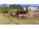 Shoal Creek community entrance featuring landscaped grounds and beautiful signage at 12090 Conrad Circle, Hampton, GA 30228