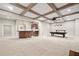 Finished basement featuring a wet bar, coffered ceilings, a pool table, and access to other areas at 5124 Parkwood Oaks Ln, Smyrna, GA 30126