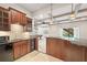 Finished basement with wet bar, access to outdoors, and coffered ceilings at 5124 Parkwood Oaks Ln, Smyrna, GA 30126
