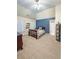 Bright bedroom with vaulted ceiling, blue accent wall, and charming decor at 5124 Parkwood Oaks Ln, Smyrna, GA 30126