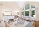 Bright, open-concept living room and kitchen with hardwood flooring and modern finishes at 5124 Parkwood Oaks Ln, Smyrna, GA 30126