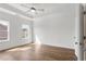 Bedroom boasts hardwood floors, abundant natural light, and modern tray ceiling at 2340 Edgar Park Pl # 97, Duluth, GA 30096
