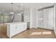 Modern kitchen features a large island, stainless steel appliances, and open floor plan at 2340 Edgar Park Pl # 97, Duluth, GA 30096