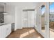 Bright white kitchen featuring modern cabinets, stainless steel appliances, and hardwood flooring at 2340 Edgar Park Pl # 97, Duluth, GA 30096