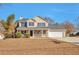 Charming two-story home featuring a welcoming front porch and a well-maintained lawn at 4785 Beaver Rd, Loganville, GA 30052