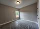 Bedroom with neutral paint and a window letting in natural light at 490 Benson Meadows Dr, Dallas, GA 30157