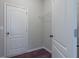 Walk-in closet with white shelving provides ample storage space in this well-maintained home at 490 Benson Meadows Dr, Dallas, GA 30157