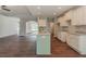 This kitchen features an open concept with modern appliances and lots of cabinet space at 490 Benson Meadows Dr, Dallas, GA 30157