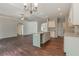 This kitchen features an open concept with modern appliances and lots of cabinet space at 490 Benson Meadows Dr, Dallas, GA 30157