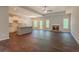 Spacious open floor plan with hardwood floors, stone fireplace, and kitchen island at 490 Benson Meadows Dr, Dallas, GA 30157