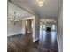 Inviting living area with dark hardwood floors, white trim, and a cozy fireplace at 490 Benson Meadows Dr, Dallas, GA 30157