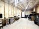 Unfinished basement featuring exposed insulation, concrete walls, and a white door leading to another room at 305 Red Gate Ln, Canton, GA 30115