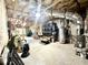 Unfinished basement featuring a water heater, furnace, and ample storage space at 305 Red Gate Ln, Canton, GA 30115