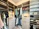 Spacious walk-in closet with custom shelving, drawers, and ample space for clothing and shoes at 305 Red Gate Ln, Canton, GA 30115