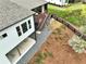 Rear exterior featuring a deck, patio, and fenced backyard with tasteful landscaping at 305 Red Gate Ln, Canton, GA 30115