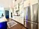 Modern kitchen with stainless steel appliances, granite countertops, and a pantry, great for storage and meal preparation at 305 Red Gate Ln, Canton, GA 30115