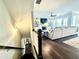 Cozy living room boasts natural light, fireplace, built-in shelving, and hardwood floors at 305 Red Gate Ln, Canton, GA 30115