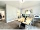 Bright home office with natural light, a wooden desk, and comfortable workspace at 305 Red Gate Ln, Canton, GA 30115