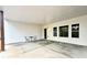 Covered patio with concrete flooring, a seating area, and an open view to the backyard at 305 Red Gate Ln, Canton, GA 30115