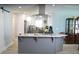 Well-designed kitchen with a large island, modern appliances, and ample counter space at 3440 Camelot Way, Loganville, GA 30052