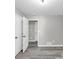 Open bedroom featuring closet space and wood floors at 3690 Darrah Sw Way, Atlanta, GA 30331