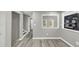 Hallway with modern gray walls and view of living area at 3690 Darrah Sw Way, Atlanta, GA 30331