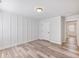 Bedroom featuring plank floors, neutral walls and modern lighting at 4035 Hosch Retreat Dr, Buford, GA 30519