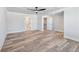 Inviting bedroom featuring modern ceiling fan, with access to multiple rooms at 4035 Hosch Retreat Dr, Buford, GA 30519