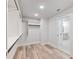 Walk-in closet featuring custom shelving and convenient access to the ensuite bathroom at 4035 Hosch Retreat Dr, Buford, GA 30519